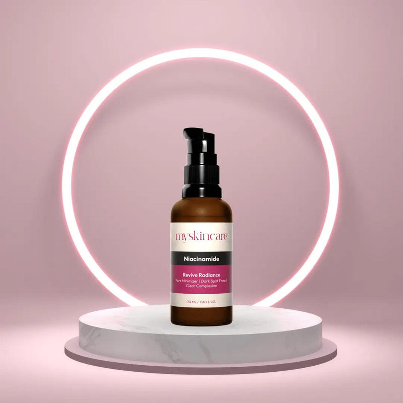 Revive Radiance Serum with Niacinamide and Alpha Arbutin to brighten skin, fade dark spots, and control oil for a radiant complexion.